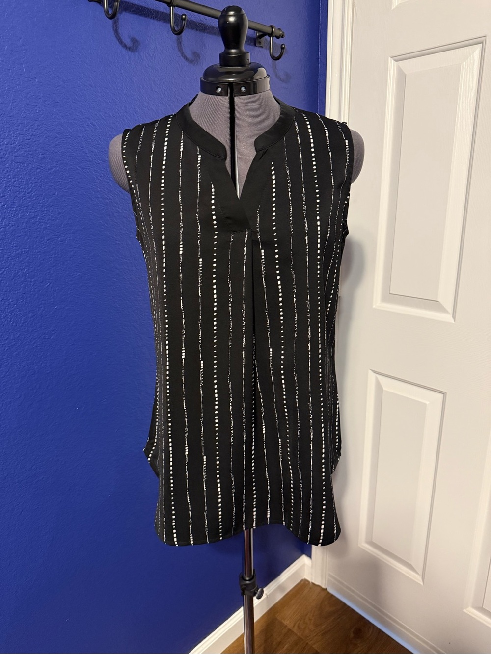 Sleeveless Black Split-Neck Tunic with Silver Stripe Detail